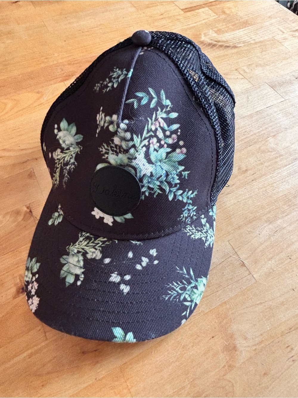 Dakine Floral Black Mesh Trucker Hat with Mint Green Accents